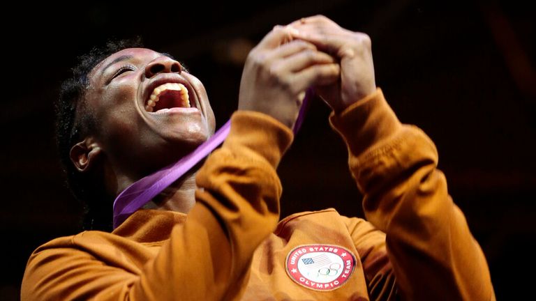  boxing gold medalist Claressa Shields, of the United States, reacts during the medal ceremony at the 2012 Summer Olympics,in London.