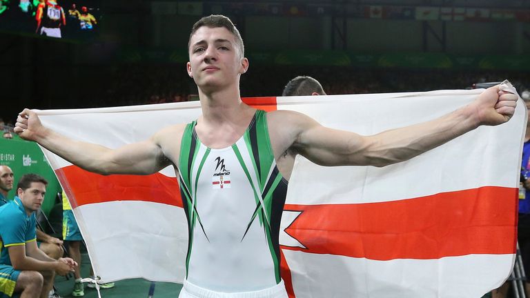Rhys McClenaghan celebrates after winning the men's pommel horse event during the artistic gymnastics men's apparatus final at the 2018 Commonwealth Games (Associated Press)
