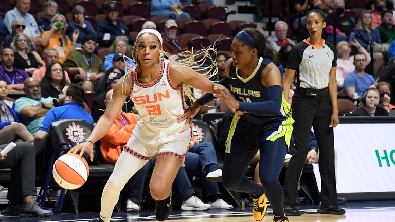 DiJonai Carrington #21 of the Connecticut Sun dribbles the ball during the game against the Dallas Wings on May 26, 2022 at Mohegan Sun Arena in Uncasville