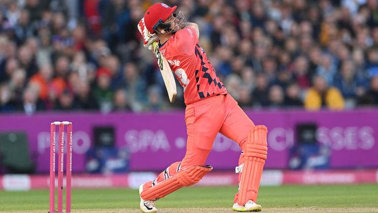 Lightning batsman Liam Livingstone hits a six during the Vitality T20 Blast match between Lancashire Lightning and Yorkshire Vikings at Emirates Old Trafford on May 27, 2022 in Manchester, England. 