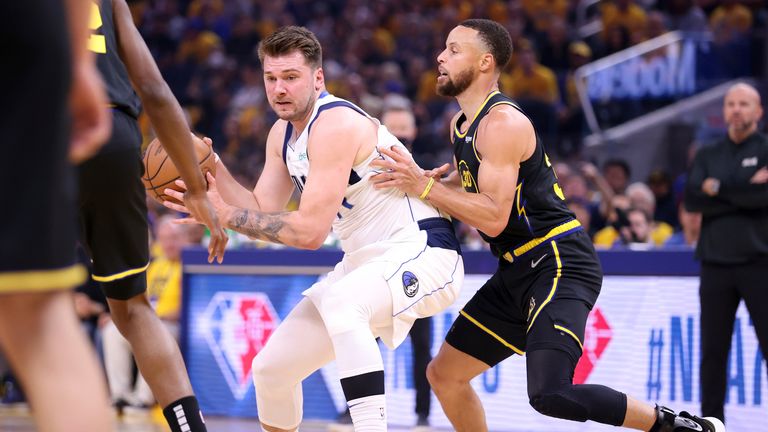 Golden State Warriors&#39; Stephen Curry guards Dallas Mavericks&#39; Luka Doncic in 1st quarter of Game 1 of NBA Western Conference Finals at Chase Center in San Francisco on Wednesday, May 18, 2022. 