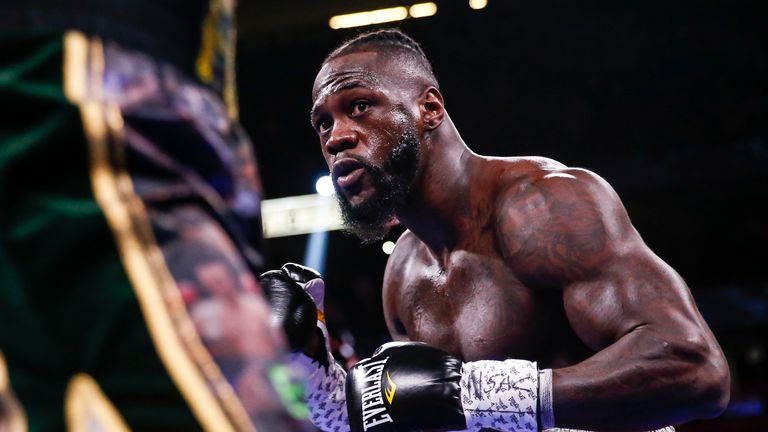  Deontay Wilder fights Tyson Fury in a heavyweight championship boxing match