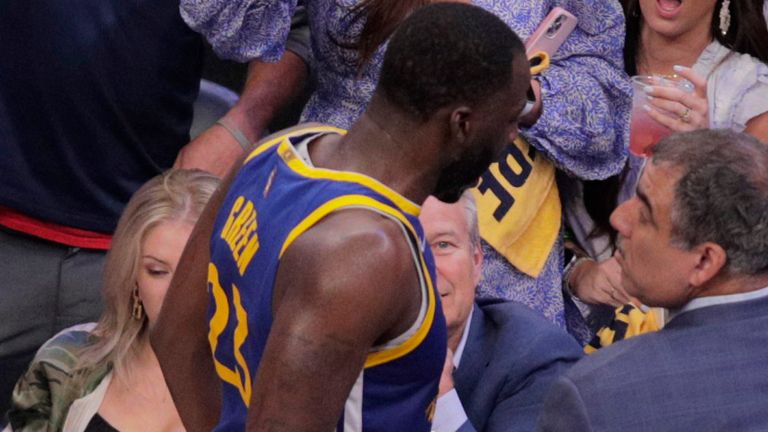 Draymond Green leaves the court after being ejected for a Flagrant 2 technical foul in the first half of Game 1