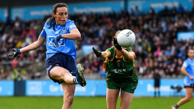 7 May 2022; Hannah Tyrrell of Dublin scores a point from play despite the efforts of Mary Kate Lynch of Meath during the TG4 Leinster Senior Ladies Football Championship Round 2 match between Dublin and Meath at Parnell Park in Dublin. Photo by Sam Barnes/Sportsfile