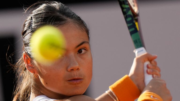 Emma Raducanu returns the ball to Bianca Andreescu during their match at the Italian Open tennis tournament, in Rome, Tuesday, May 10, 2022. (AP Photo/Andrew Medichini)