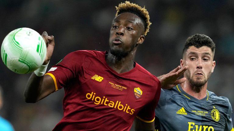 Roma's Tammy Abraham, left, challenges for the ball with Feyenoord's Marcos Senesi 