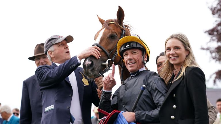 Frankie Dettori poses with connections of Stradivarius in the York winner&#39;s enclosure