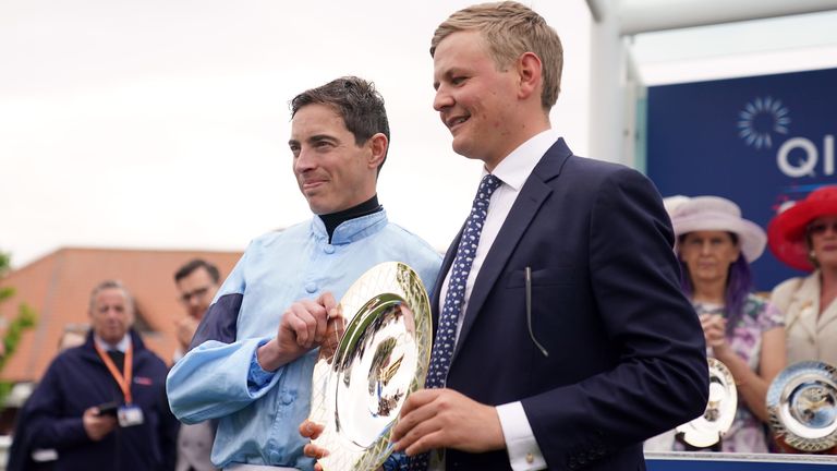 James Doyle and George Boughey celebrating Cachet's Guineas success.