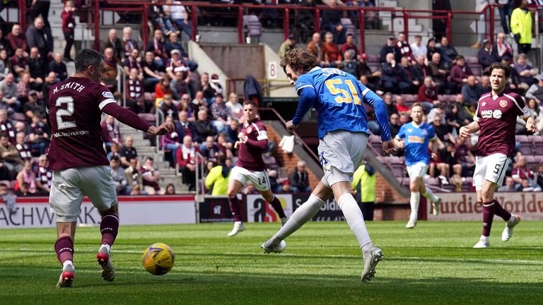 Alex Lowry curled Rangers in front with a low effort on the stroke of half-time