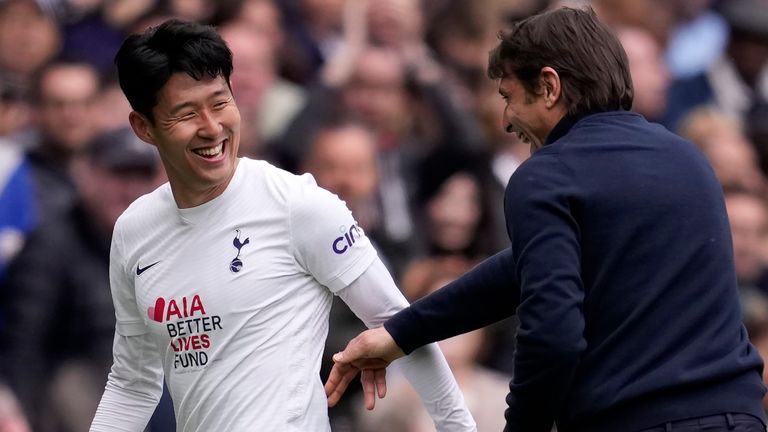 Heung Min Sung shares a carefree moment with Antonio Conte as he leaves the field