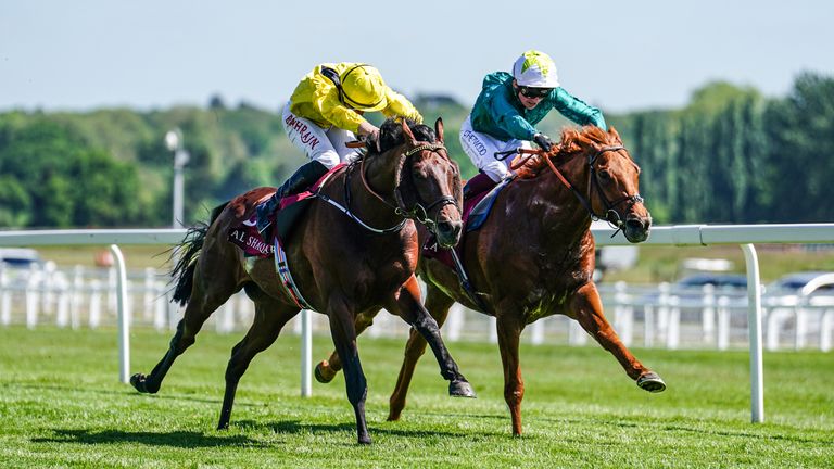 Ilaraab (near side) gets the better of Scope in the Al Rayyan Stakes at Newbury