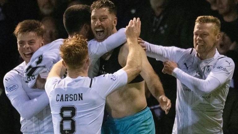 ARBROATH, SCOTLAND - MAY 13: Inverness players celebrate after Kirk Broadfoot scores the winning penalty during a Premiership Play-Off Semi-Final 2nd Leg match between Arbroath and Inverness at Gayfield, on May 13, 2022, in Arbroath, Scotland. (Photo by Ross Parker / SNS Group)