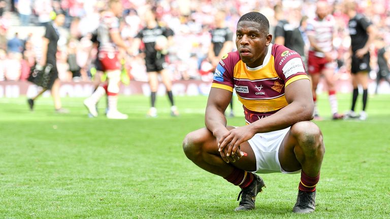 Huddersfield's Jermaine McGillvary looks dejected after his side's Challenge Cup final defeat