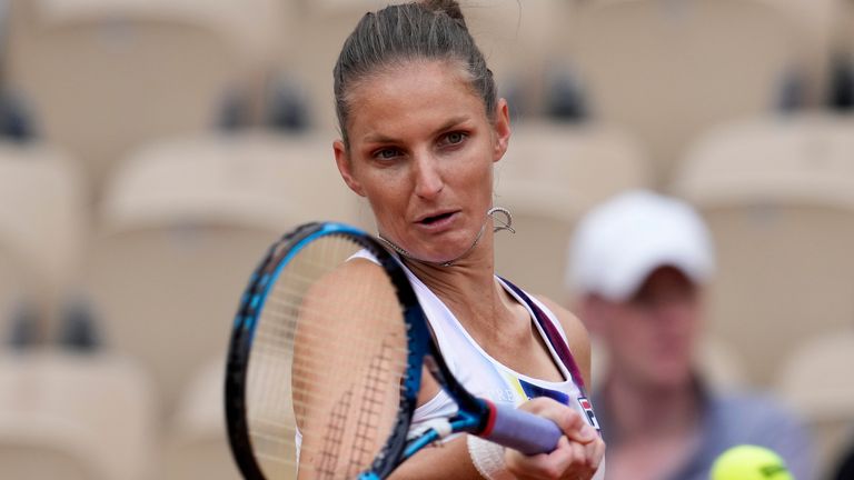 Karolina Pliskova of the Czech Republic plays a shot against France&#39;s Tessah Andrianjafitrimo during their first round match at the French Open tennis tournament in Roland Garros stadium in Paris, France, Tuesday, May 24, 2022. (AP Photo/Christophe Ena)