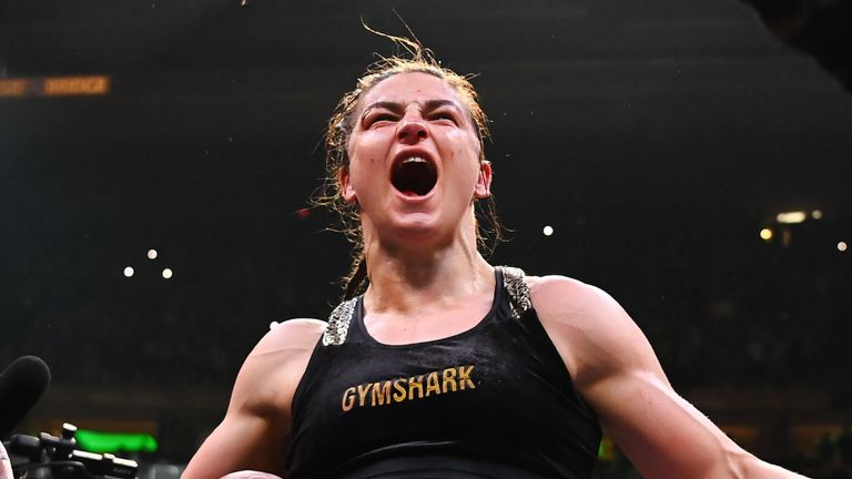 Katie Taylor celebrates victory after her undisputed world lightweight championship fight with Amanda Serrano at Madison Square Garden 
