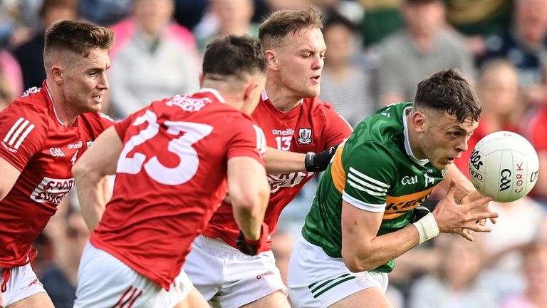 7 May 2022; David Clifford of Kerry in action against Cork players, from left, Kevin Flahive, Sean Powter and Steven Sherlock during the Munster GAA Football Senior Championship Semi-Final match between Cork and Kerry at P..irc Ui Rinn in Cork. Photo by Stephen McCarthy/Sportsfile