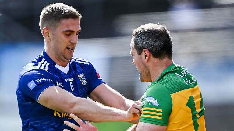 8 May 2022; Killian Clarke of Cavan and Michael Murphy of Donegal tussle off the ball during the Ulster GAA Football Senior Championship Semi-Final match between Cavan and Donegal at St Tiernach's Park in Clones, Monaghan. Photo by Piaras .. M..dheach/Sportsfile