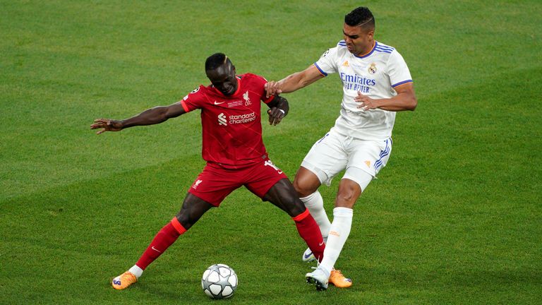 Liverpool&#39;s Sadio Mane and Real Madrid&#39;s Carlos Casemiro battle for the ball during the UEFA Champions League Final at the Stade de France
