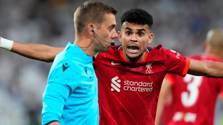 Liverpool's Luis Diaz complains to the referee during the Champions League final soccer match between Liverpool and Real Madrid at the Stade de France in Saint Denis near Paris, Saturday, May 28, 2022. (AP Photo/Petr David Josek)