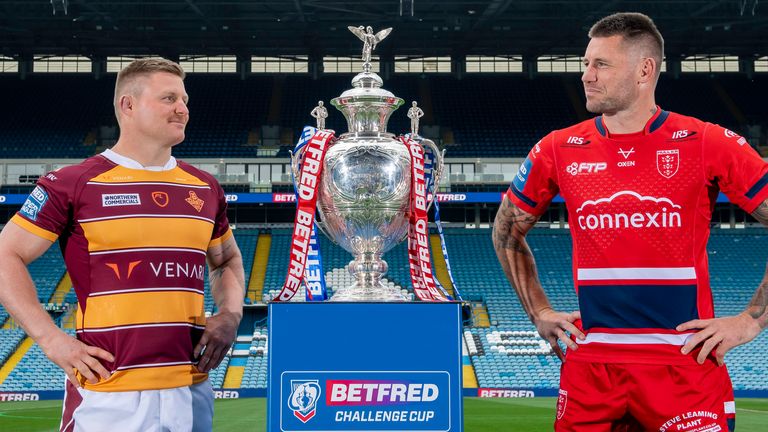 Picture by Allan McKenzie/SWpix.com - 03/05/2022 - Rugby League - Betfred Challenge Cup Semi Final Triple Header Preview - Elland Road, Leeds, England - Huddersfield's Luke Yates & Hull KR's Shaun Kenny-Dowall with the Betfred Challenge Cup.