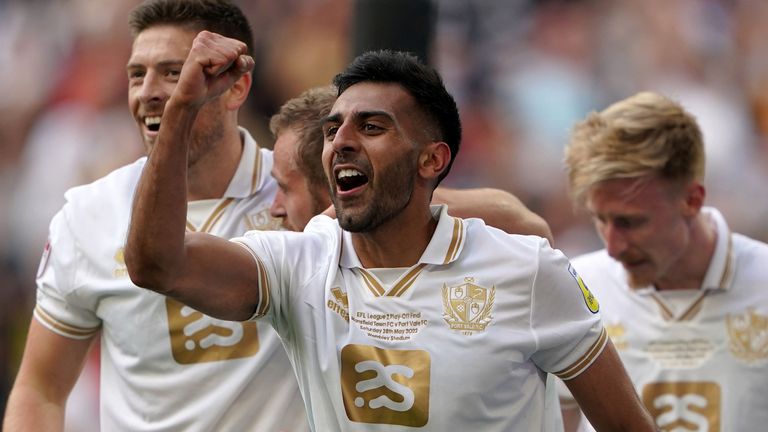 Port Vale's Mal Benning (left) celebrates scoring his sides third goal of the game during the Sky Bet League Two play-off final at Wembley Stadium, London. Picture date: Saturday May 28, 2022.