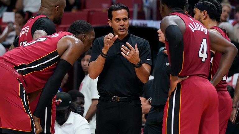 Miami Heat head coach Erik Spoelstra, center, talks with players during Game 5 of the first-round series against the Atlanta Hawks