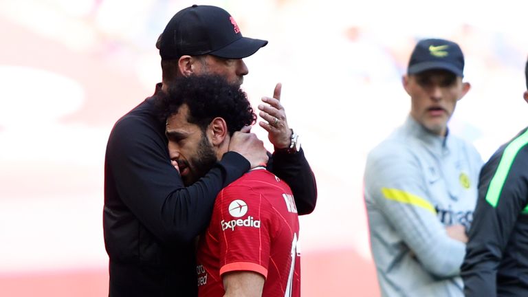 Liverpool&#39;s manager Jurgen Klopp hugs Mohamed Salah after he got injured and had to be substituted