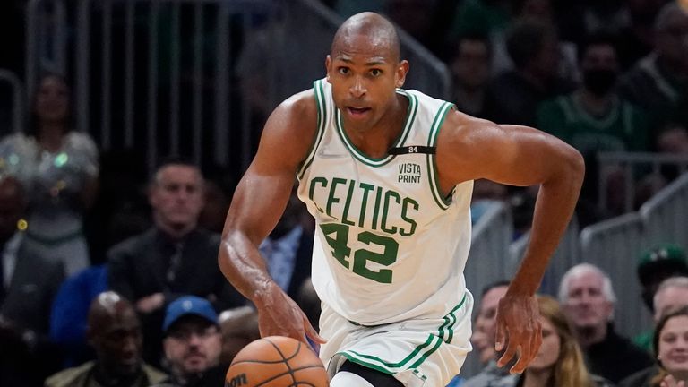 Boston Celtics center Al Horford dribbles downcourt during the second half of Game 4 of the NBA basketball playoffs Eastern Conference finals against the Miami Heat, Monday, May 23, 2022, in Boston. 