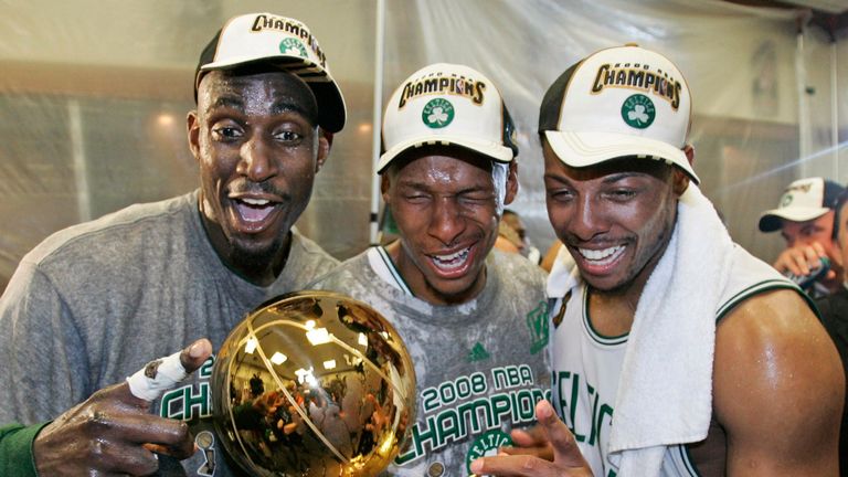FILE - In this June 17, 2008 file photo, Boston Celtics&#39; Kevin Garnett, left, Ray Allen, center, and Paul Pierce celebrate in the locker room after winning the NBA basketball championship with a 131-92 win over the Los Angeles Lakers in Boston