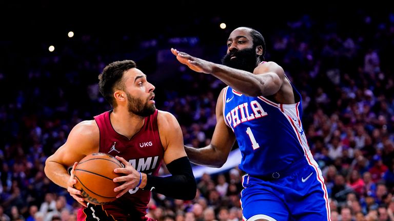 Philadelphia 76ers&#39; James Harden (1) defends against Miami Heat&#39;s Max Strus during the first half of Game 6 of an NBA basketball second-round playoff series, Thursday, May 12, 2022, in Philadelphia. (AP Photo/Matt Slocum)


