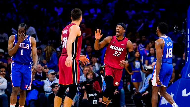 Miami Heat&#39;s Jimmy Butler (22) reacts during the second half of Game 6 of an NBA basketball second-round playoff series against the Philadelphia 76ers, Thursday, May 12, 2022, in Philadelphia. (AP Photo/Matt Slocum)


