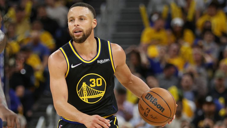 Golden State Warriors guard Stephen Curry brings ball up against the Dallas Mavericks during the second half of Game 1 of the NBA basketball playoffs Western Conference finals in San Francisco, Wednesday, May 18, 2022. 