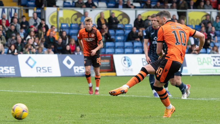 DINGWALL, SCOTLAND - MAY 14: Nicky Clark scores a penalty for Dundee United during a cinch Premiership match between Ross County and Dundee United at The Global Energy Stadium, on May 14, 2022, in Dingwall, Scotland. (Photo by Paul Devlin / SNS Group)