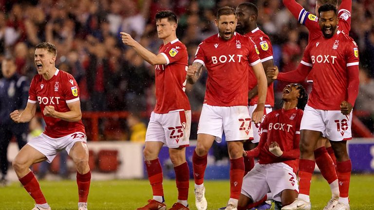 The Nottingham Forest players celebrate their penalty shootout win over Sheffield United