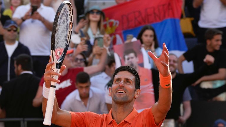 Novak Djokovic celebrates winning the Italian Open title in Rome