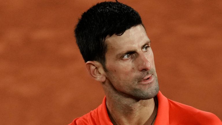Serbia&#39;s Novak Djokovic reacts as he plays Spain&#39;s Rafael Nadal during their quarterfinal match of the French Open tennis tournament at the Roland Garros stadium Tuesday, May 31, 2022 in Paris. (AP Photo/Thibault Camus)