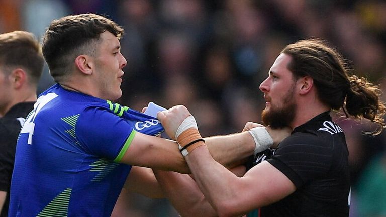 Clifford and O'Hora get to grips with one another during the Division 1 final