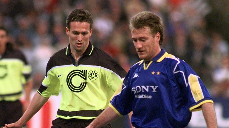 Borussia Dortmund's Paul Lambert, left, and Juventus French defender Didier Deschamps challenge for the ball during their Champions Cup final match, at the Munich Olympic stadium Wednesday, May 28, 1997.