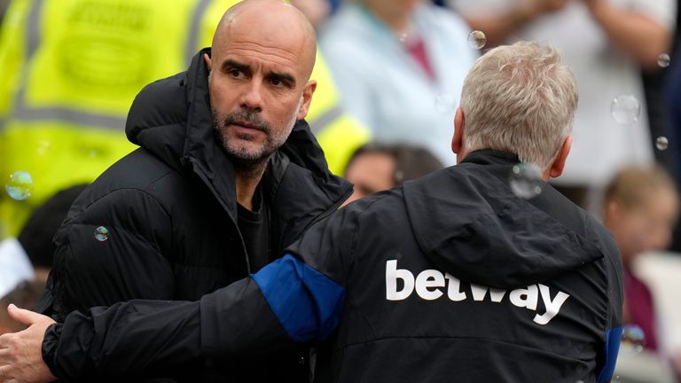 Pep Guardiola shakes hands with David Moyes after Man City's draw with West Ham