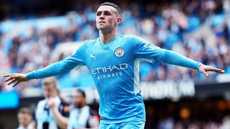 Phil Foden celebrates after putting Man City 4-0 up against Newcastle