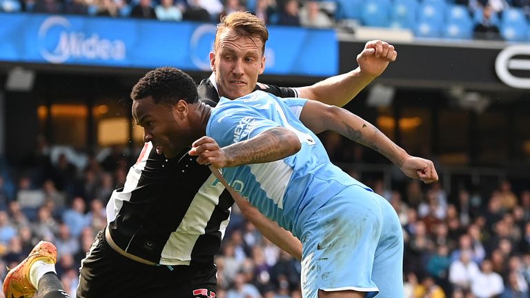 Raheem Sterling head home Man City's opening goal against Newcastle
