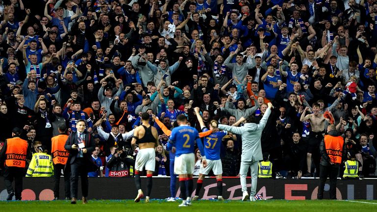 Rangers players and fans celebrating their Europa League semi-final triumph
