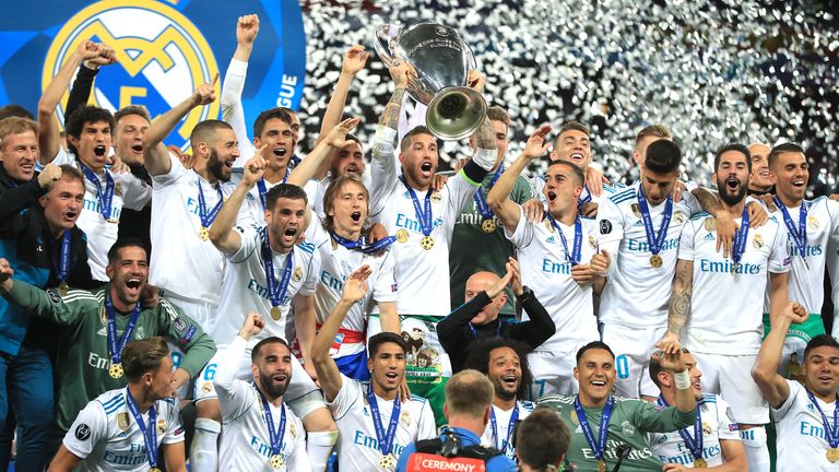 Real Madrid&#39;s Sergio Ramos lifts the Champions League trophy after victory over Liverpool in the 2018 final 