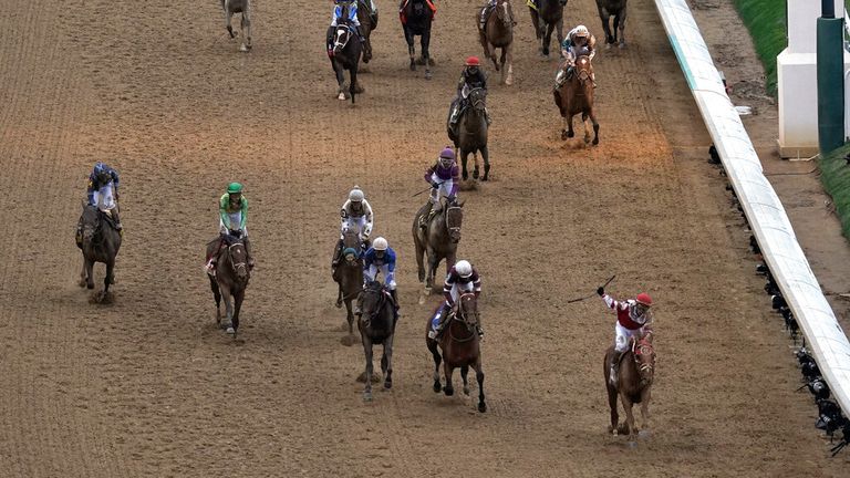 Rich Strike charged down the inside rail to win the Kentucky Derby