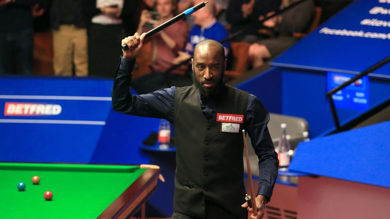 Rory McLeod celebrates after his victory over Judd Trump at the Snooker World Championships at the Crucible Theatre in 2017. 