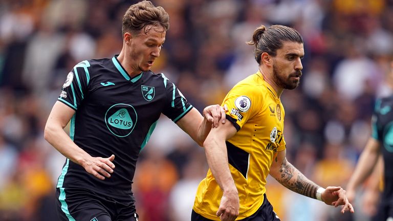 Wolverhampton Wanderers' Ruben Neves gets away from Norwich City's Kieran Dowell 