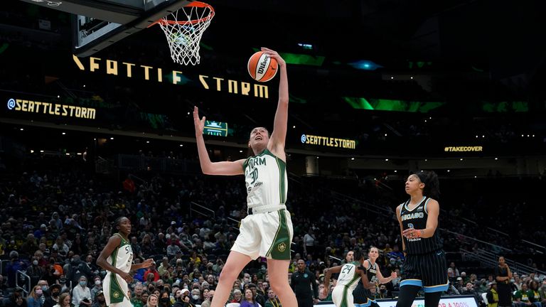 Seattle Storm forward Breanna Stewart (30) grabs a rebound next to Chicago Sky forward Candace Parker, right, during the first half of a WNBA basketball game Wednesday, May 18, 2022, in Seattle. 