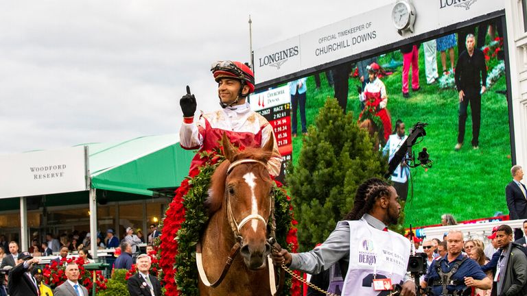 Sonny Leon celebrates after winning the Run for the Roses, the Kentucky Derby.