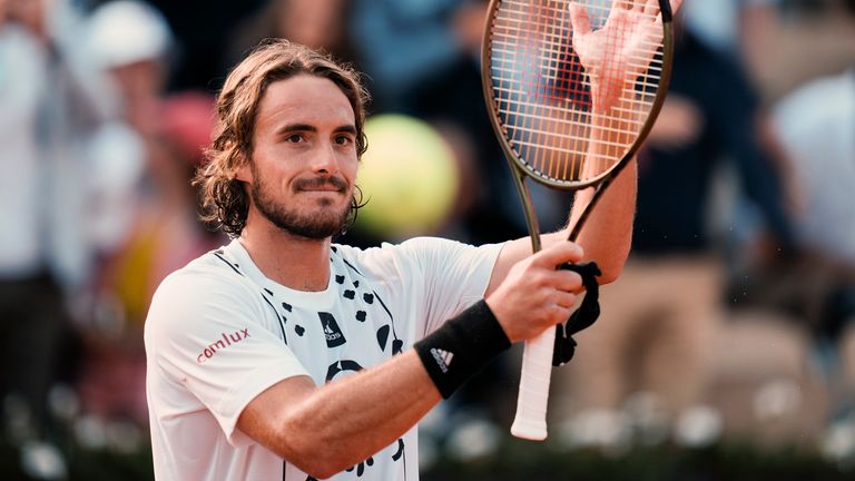 Greece's Stefanos Tsitsipas celebrates winning against Sweden's Mikael Ymer in three sets, 6-2, 6-2, 6-1, during their third round match at the French Open tennis tournament in Roland Garros stadium in Paris, France, Saturday, May 28, 2022. (AP Photo/Thibault Camus)
