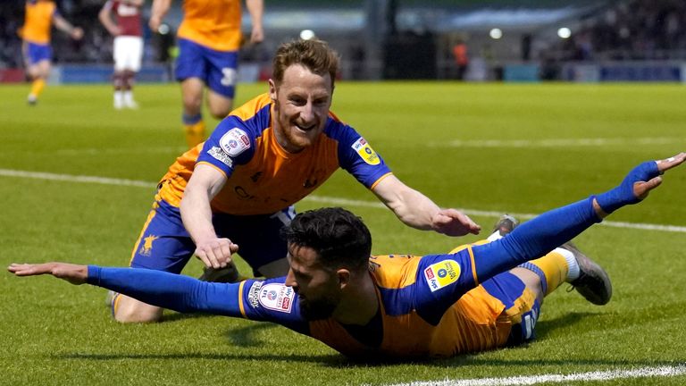 Mansfield Town&#39;s Stephen McLaughlin celebrates scoring their side&#39;s first goal of the game during the Sky Bet League Two play-off semi-final, second leg